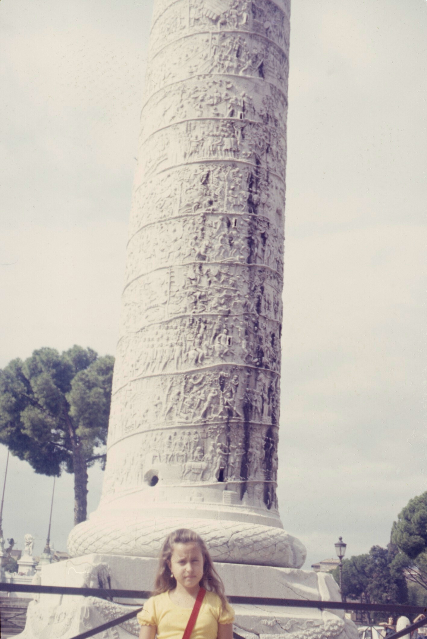A traveler was born - Annabella's first trip to Europe in 1975. Trajan's Column in Rome, already fending off pickpockets by wearing my purse criss-cross.