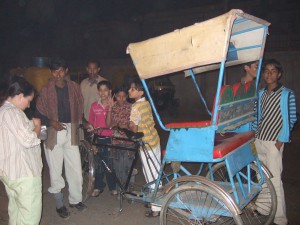 Giving our driver some sweets after bicycling us back to our hotel, and a bunch of hopeful kids.