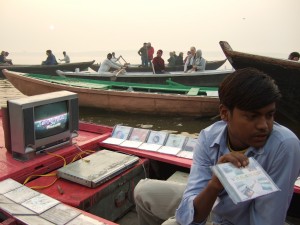 Another Ganges entreprenuer, with a working TV out in the middle of the river