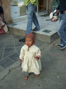 Walking around by herself, crying for her mom (no where to be found), but no one but us seemed particularly worried.  Mom showed up later.