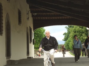 Riding a rented bike along the ancient walls of Lucca.