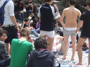 Italian teen getting ready to jump into the water and to discover that tightie whities+water+Italian teen girls in bikini tops/excitement = uh-oh