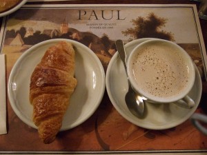 Cafe au lait and a croissant at Paul (a small chain with an outlet on the Rue de Buci, near Odeon Metro)