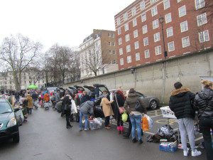 They call it a Boot Sale because people really do sell stuff out of the boot/trunk of their cars. This is a weekly one in Pimlico, and we bought a lovely painting that now hangs in our living room.