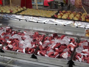 Octopus balls. Think octopus in a blanket (like an undercooked pancake ball).