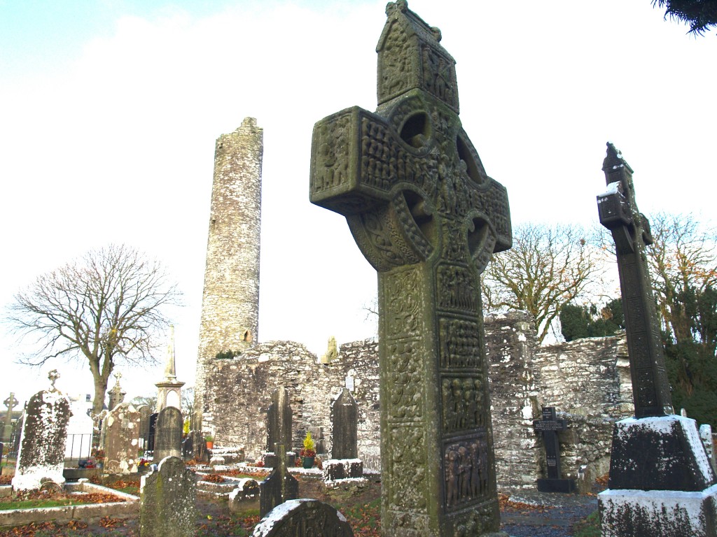 Old graves, high crosses and round towers mix with new graves at Monasterboice.