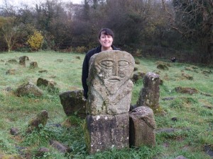 One face (or two faces?) of the Janus Stone.  Notice the good luck coins left by visitors on the short stone to the right.