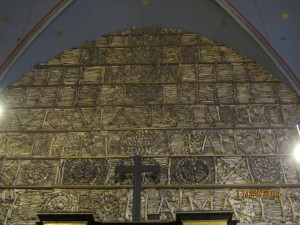 The walls above the reliquaries are decorated entirely in bones.